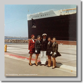 All four of us with the captain of the Queen Mary 
